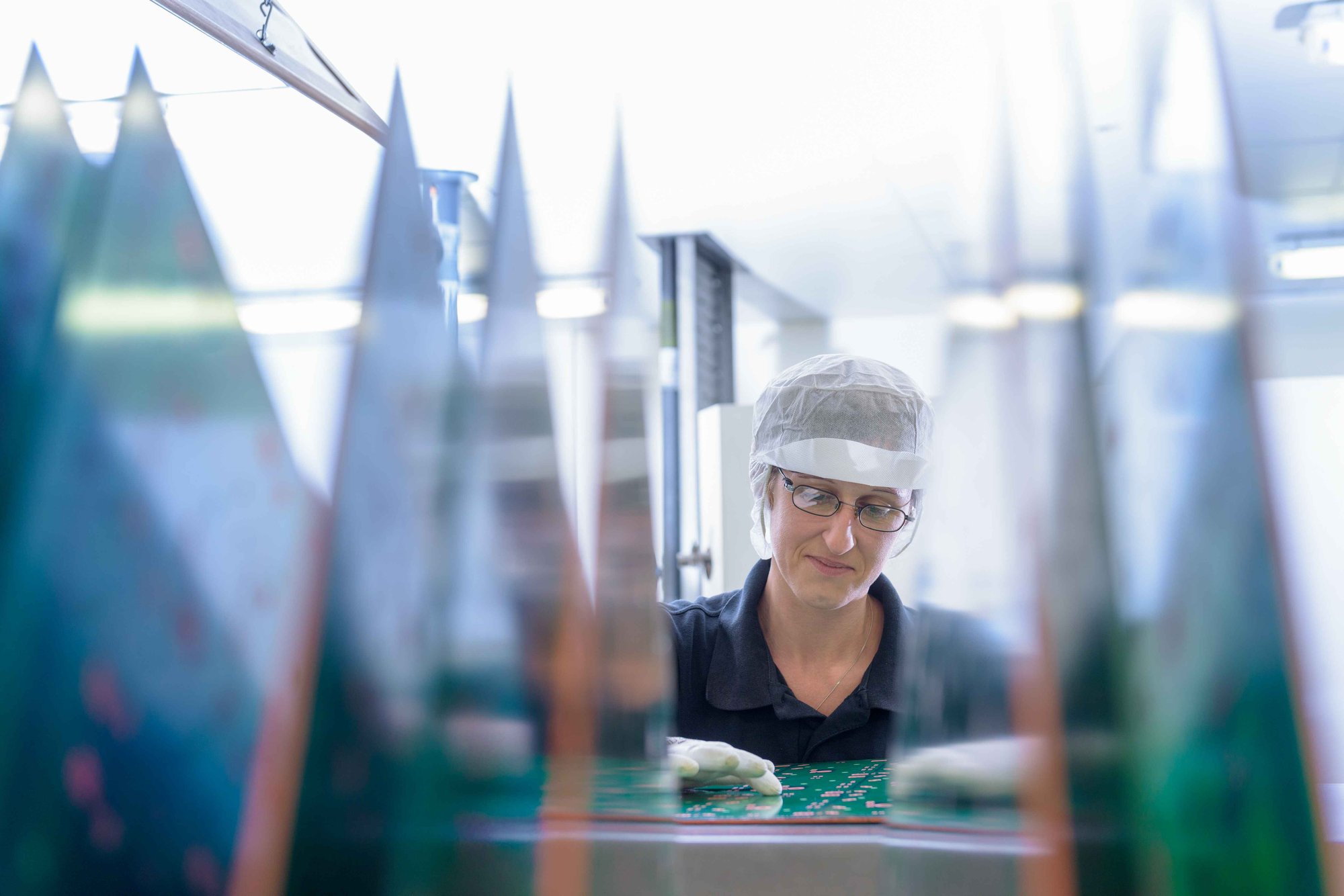 A circuit board manufacturing worker