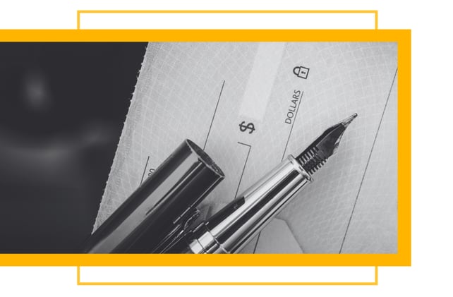 a pen and check