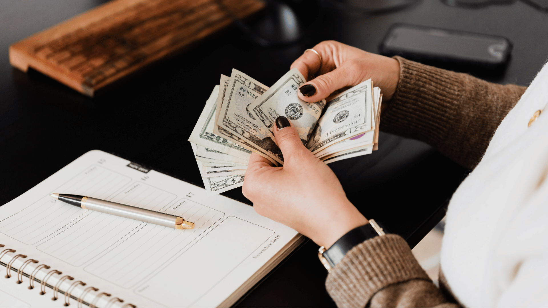 Person Counting Money for Prevailing Wages